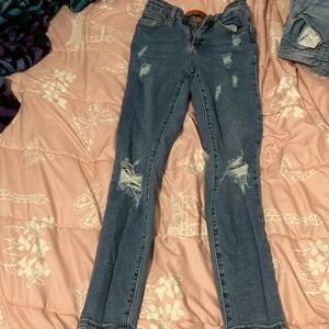 Brand is WAX Jean, size is 0/24 color blue and they’re skinny high waisted.